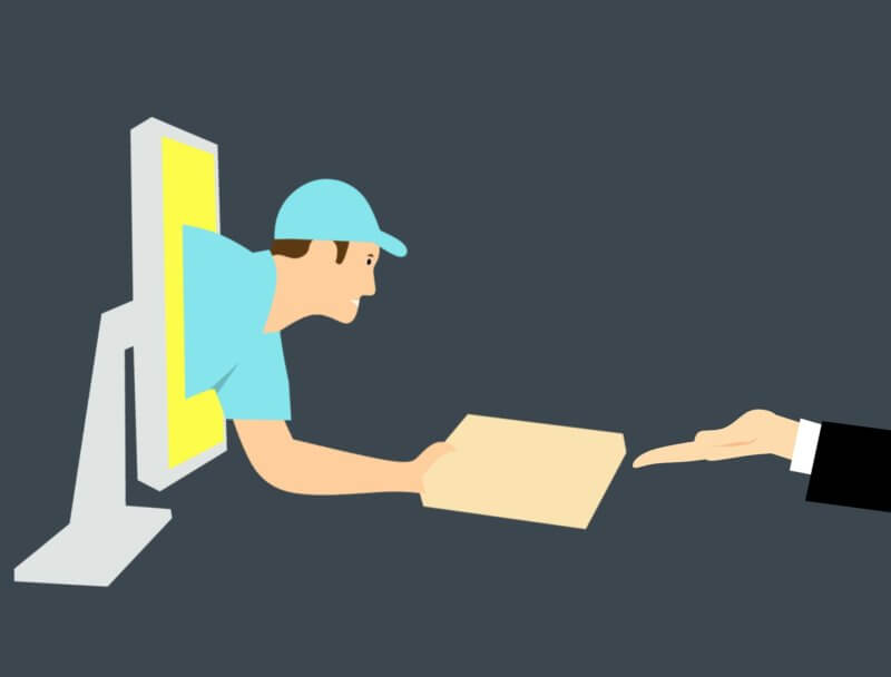 courier reaching out from computer screen to deliver package